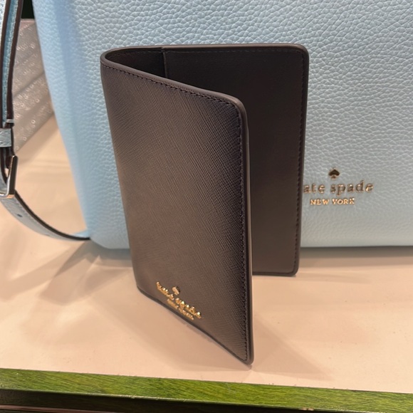 kate spade Handbags - Kate Spade Madison Leather Passport Holder, Crush Proof, Black
NWT